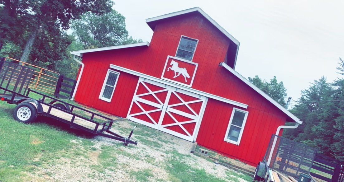 Fresh-painted Kentucky barn — S&S Fencing painting services