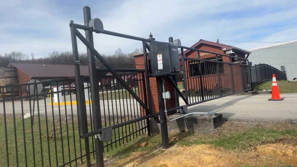 Automated commercial gate with motor at Four Roses Distillery
