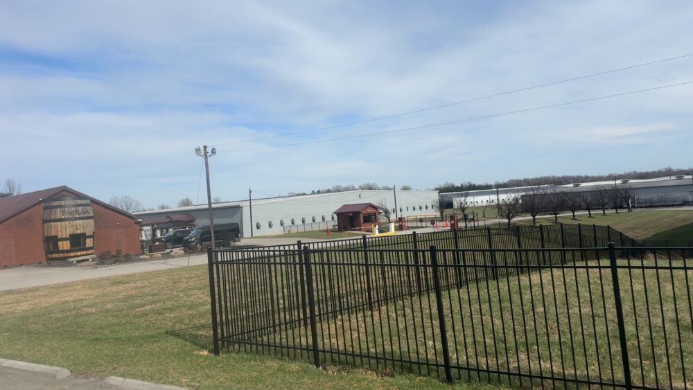 Commercial aluminum fence perimeter at Four Roses Distillery campus