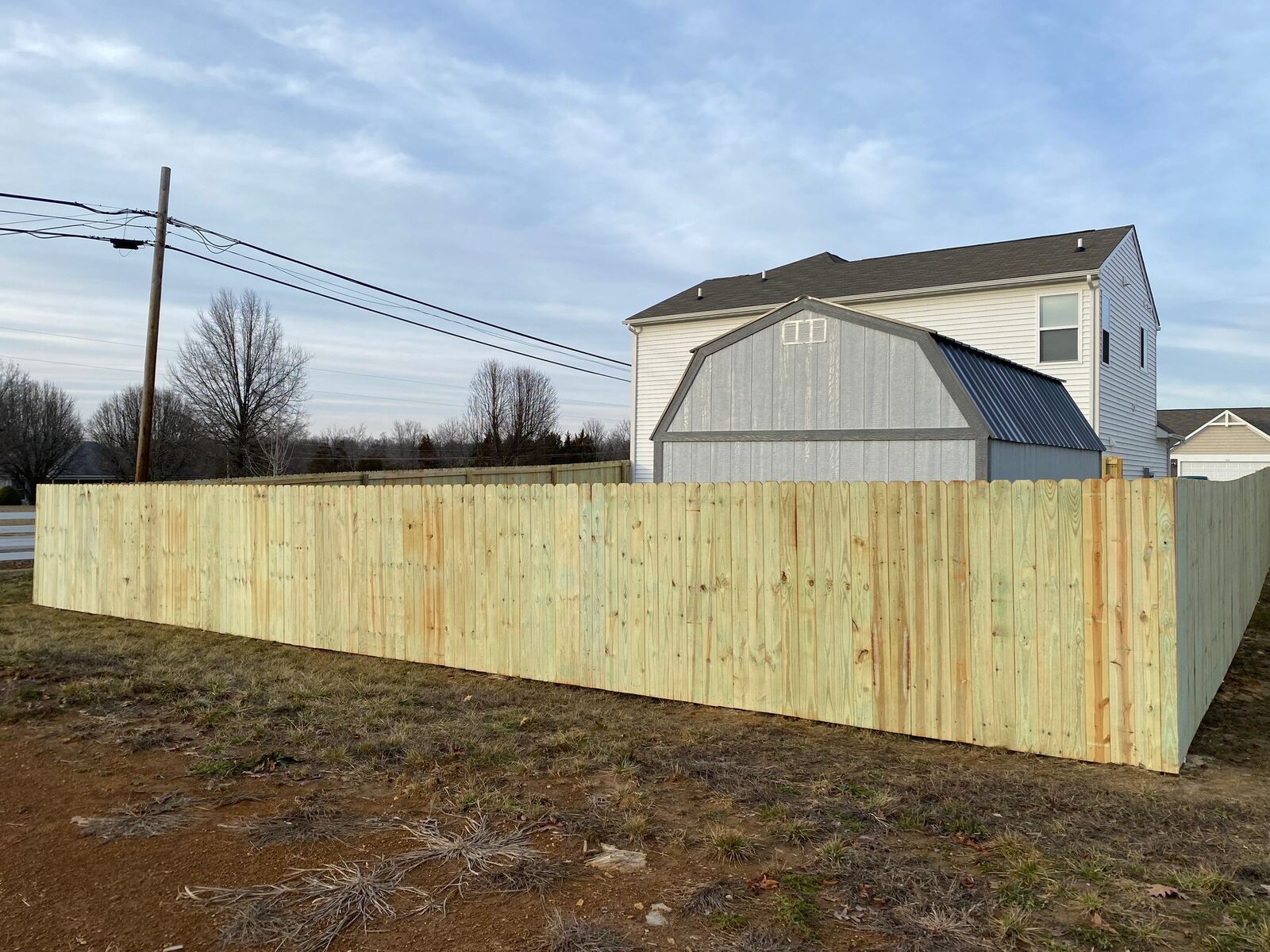 Tall white vinyl privacy fence installation, Louisville KY — S&S Fencing
